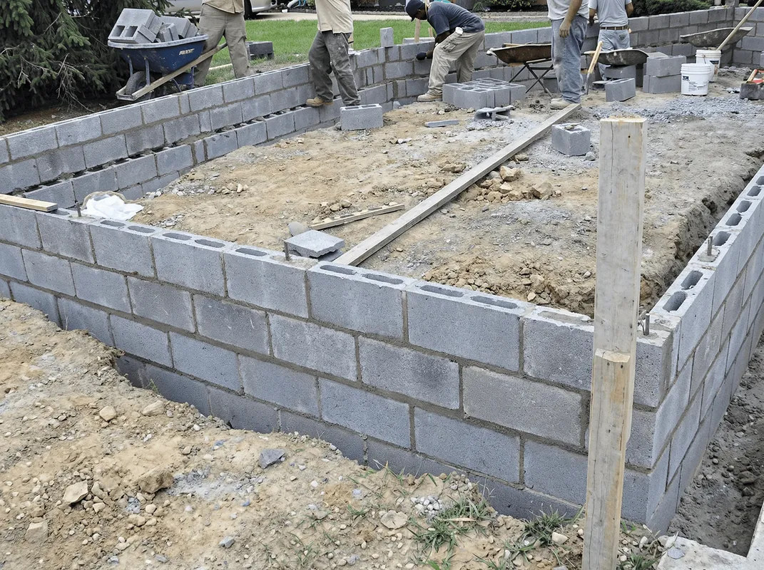 Professionals building a foundation with blocks in San Jose, CA